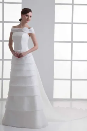 ---Classic A line style tailored wedding dress made in organza with drooping straps--