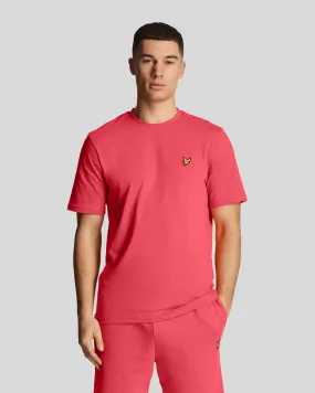 T-shirt mezza manica corallo in cotone con logo aquila gialla ricamata sul petto